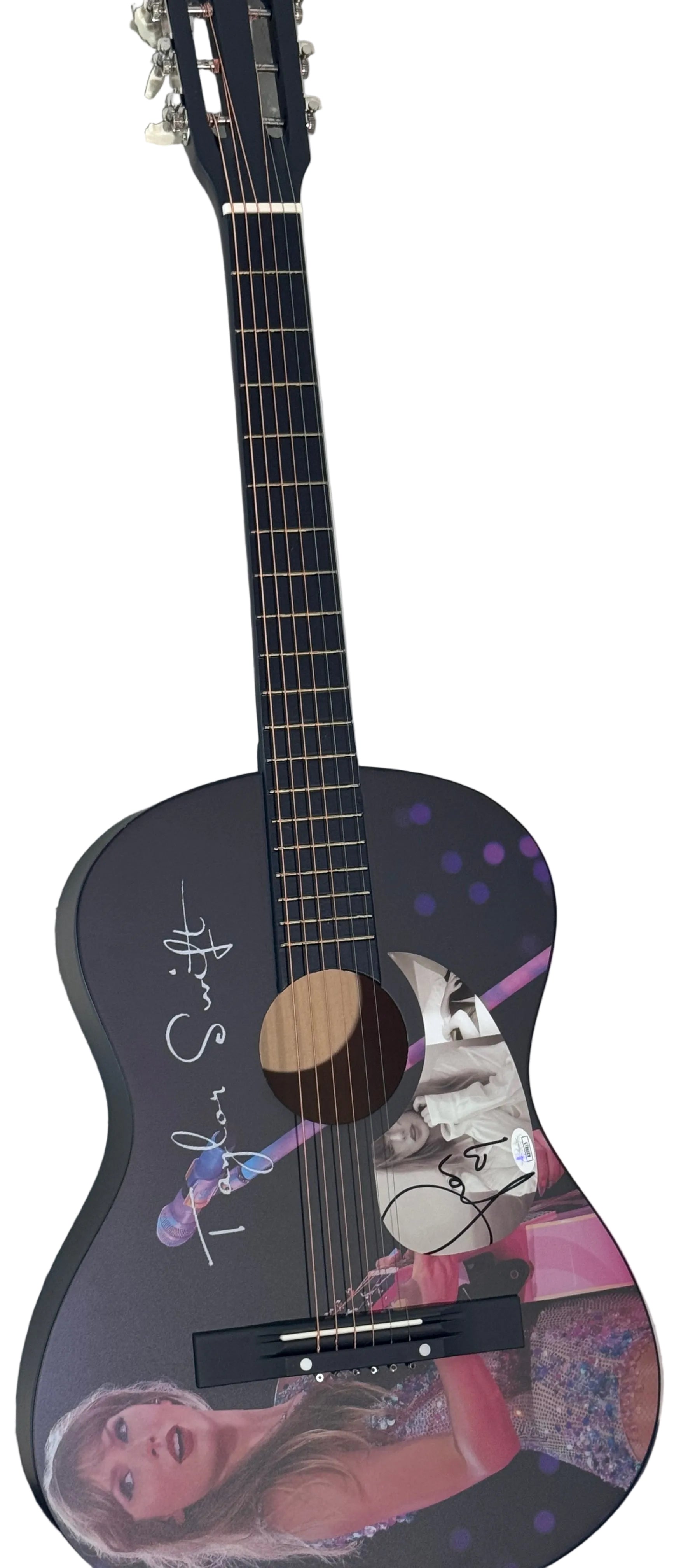 Acoustic guitar with a colorful design on a gray surface